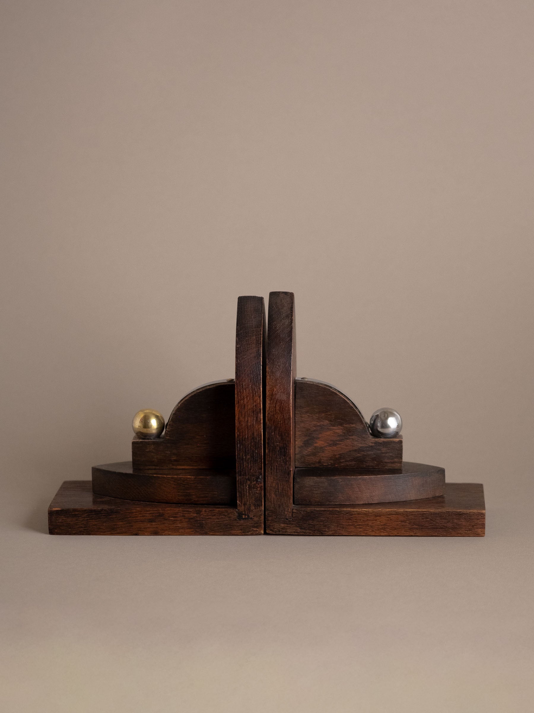 Side view of pair of Amsterdam School oak bookends, Netherlands 1920s–30s, geometric interwar design.