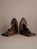 Pair of Amsterdam School oak bookends, Netherlands 1920s–30s, with geometric arched form and nickel-plated brass spheres.
