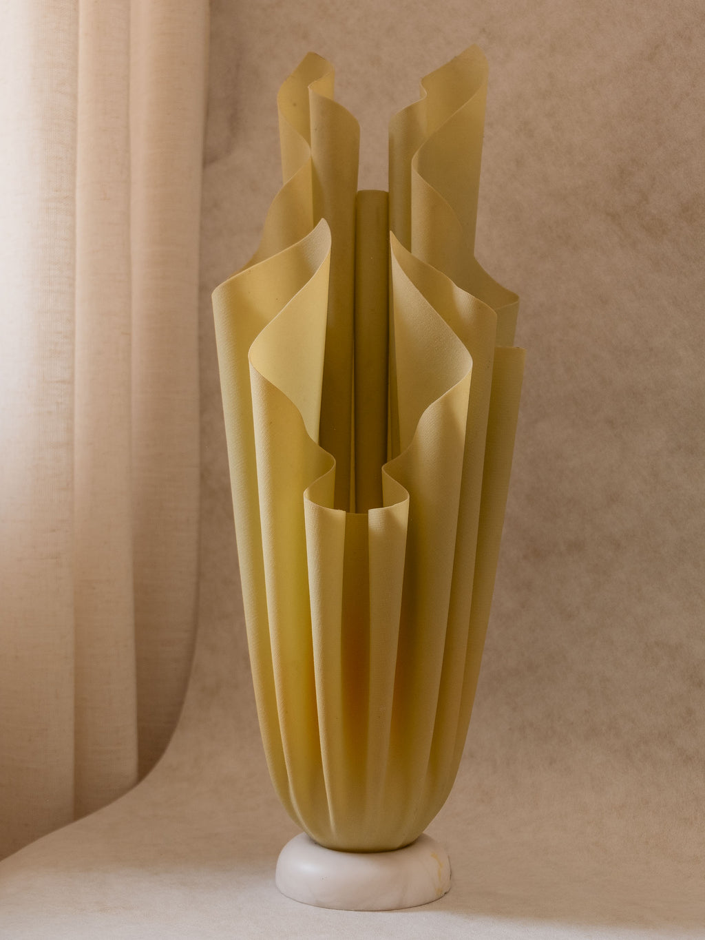 Georgia Jacob “Athena” table lamp in resin and marble, France, 1970s, shown in interior setting.