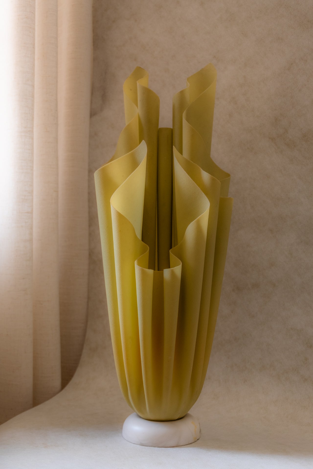 Georgia Jacob “Athena” table lamp in resin and marble, France, 1970s, shown in interior setting.