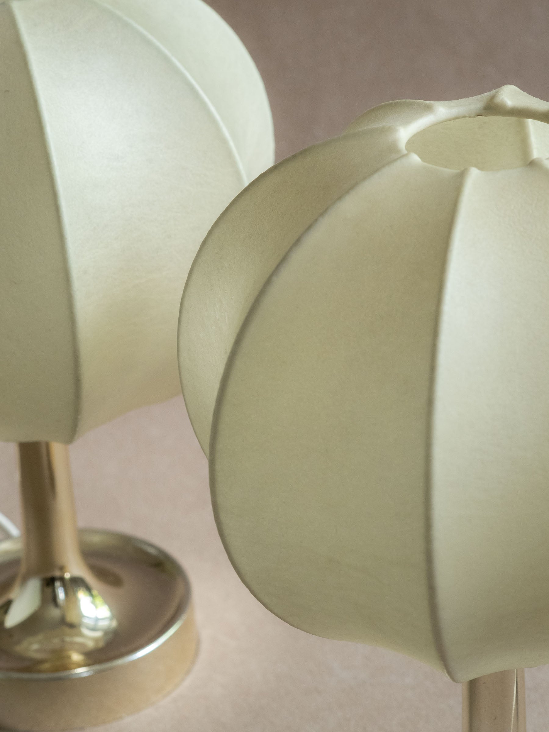 Top angled view of two Goldkant Salbo cocoon table lamps showing the open shade rims and ribbed cocoon structure.
