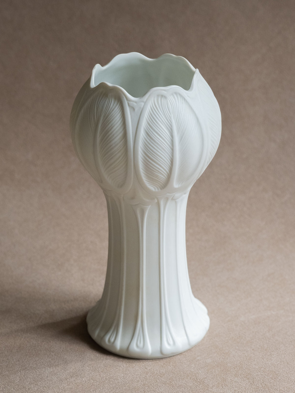Hutschenreuther model 6300 Blattrelief vase by Hans Achtziger, front view showing the tall fluted stem and sculptural leaf-shaped upper body.