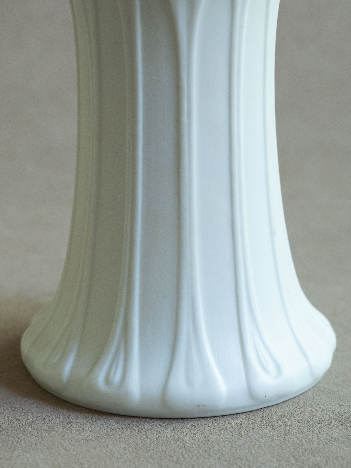 Detail of the fluted lower body and foot of the 1973 Hutschenreuther Blattrelief vase.