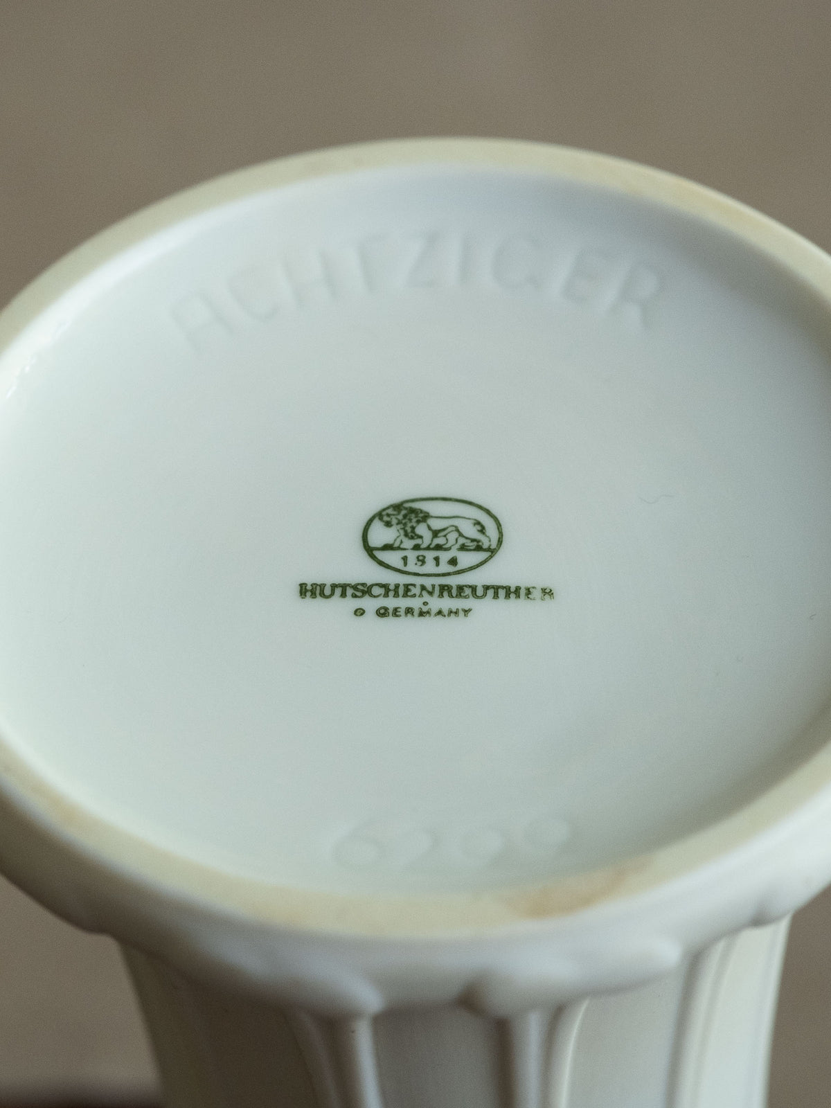 Underside of the Hans Achtziger vase showing the 1814 Hutschenreuther Germany lion maker mark and faint moulded model number.