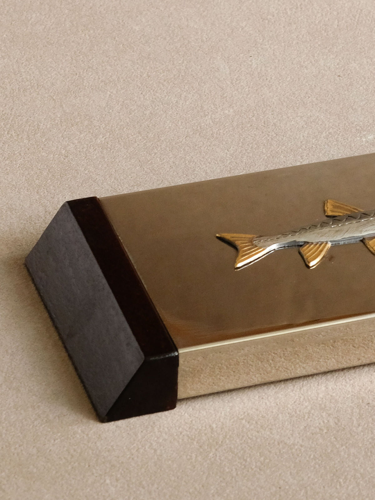 Full view of Japanese wooden and silver-toned metal tray with a raised fish decoration.