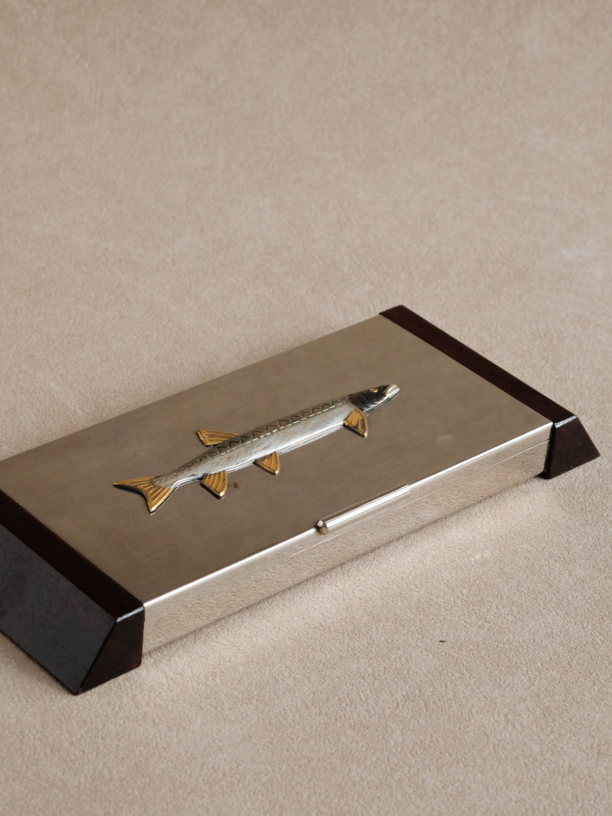 Side view showing the shallow profile and wood-and-metal construction of the Japanese tray.