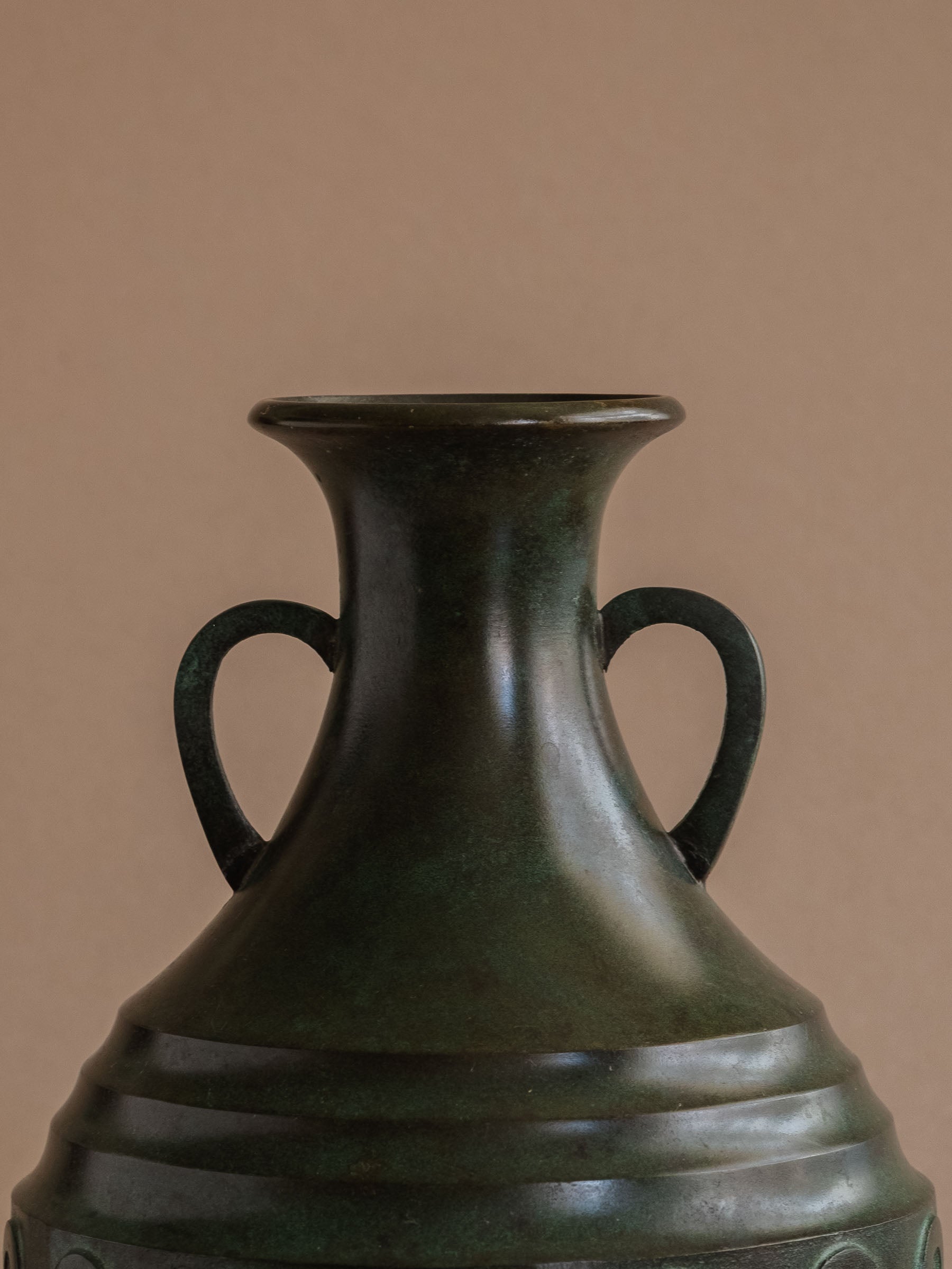Detail of flared rim and twin handles on Murata Yoshio bronze vase, Showa 1960s, Japan.