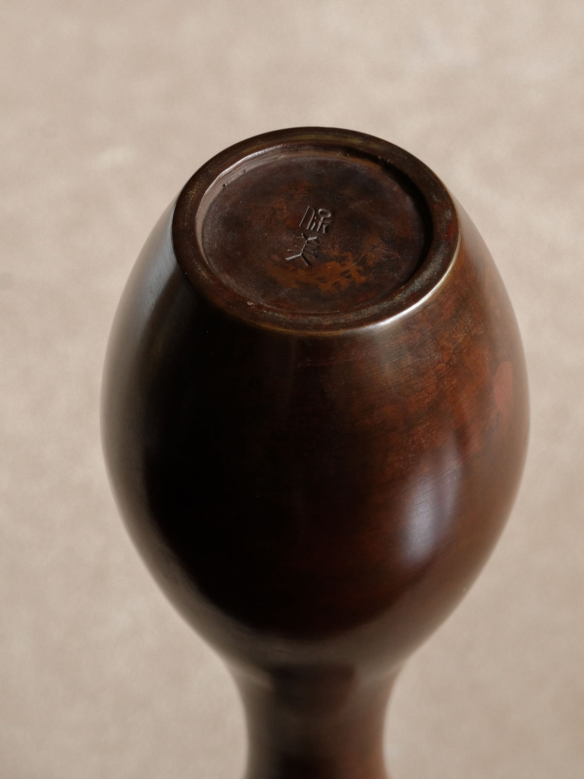 The Nakajima Yasumi bronze vase with its accompanying original wooden storage box.